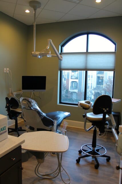 A dental chair and equipment at Triangle Family Dentistry (Cary Park)